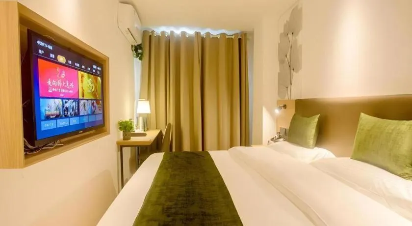 Bed in GreenTree Inn Express Hainan Haikou Haixiu Zhong Road