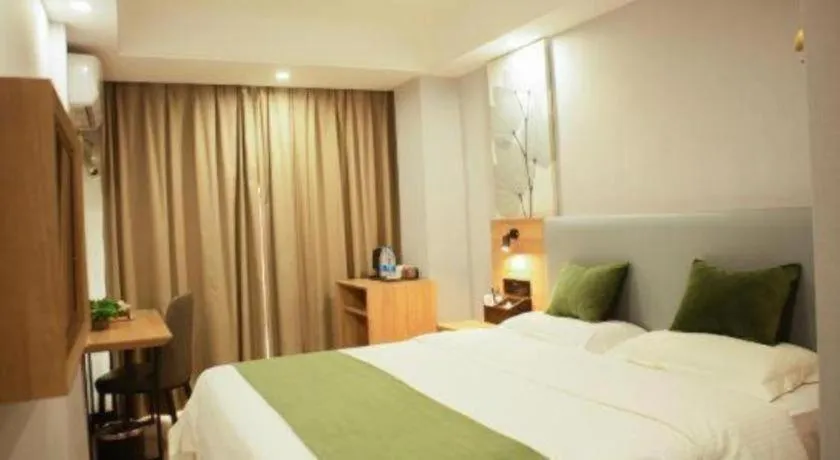 Bed in GreenTree Inn Express Hainan Haikou Haixiu Zhong Road