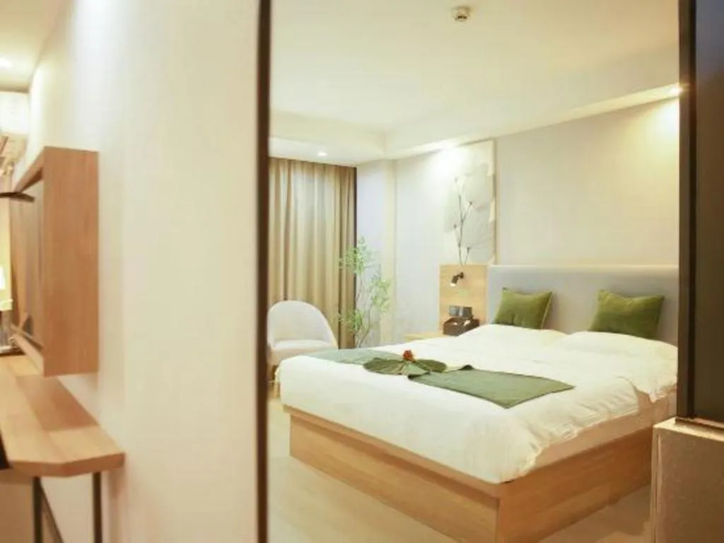 Bed in GreenTree Inn Express Hainan Haikou Haixiu Zhong Road
