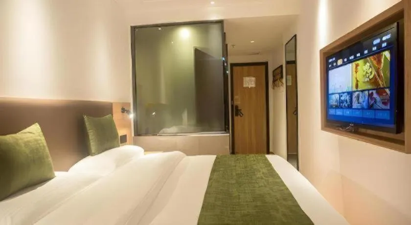 Bed in GreenTree Inn Express Hainan Haikou Haixiu Zhong Road