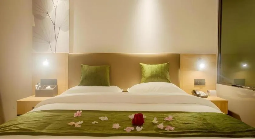 Bed in GreenTree Inn Express Hainan Haikou Haixiu Zhong Road