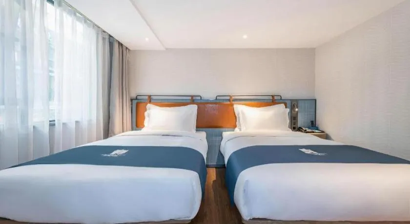 Bed in Echarm Hotel Guangzhou Tiyu West Raod Metro Station