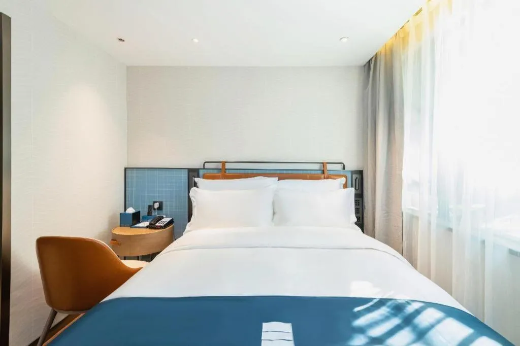 Bed in Echarm Hotel Guangzhou Tiyu West Raod Metro Station