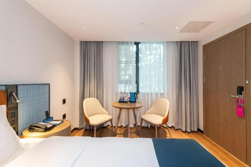 Bed in Echarm Hotel Guangzhou Tiyu West Raod Metro Station