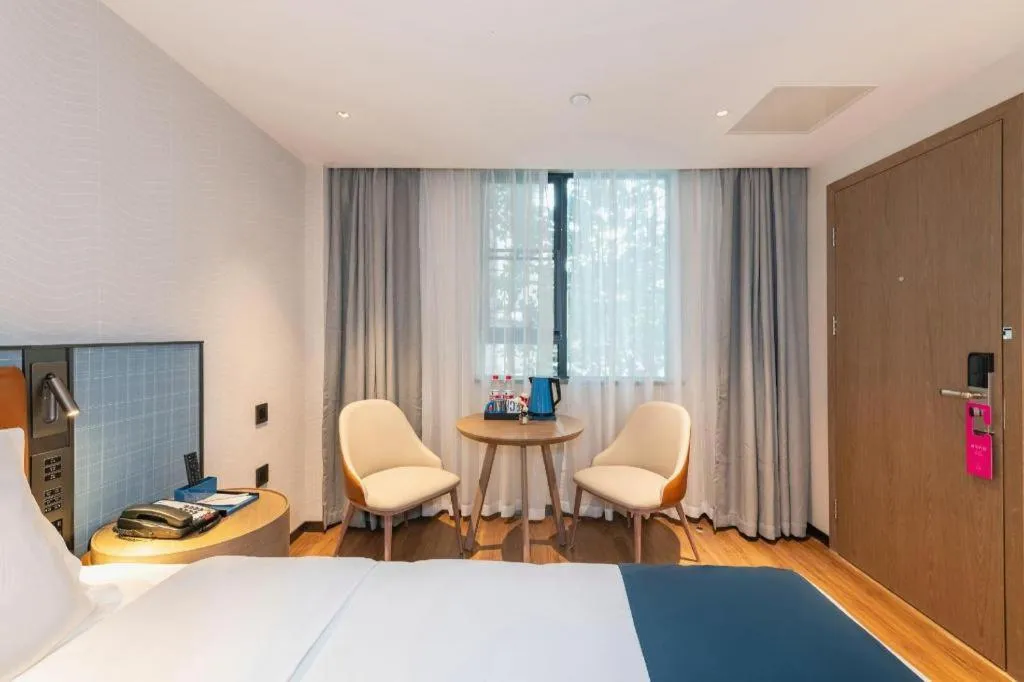 Bed in Echarm Hotel Guangzhou Tiyu West Raod Metro Station