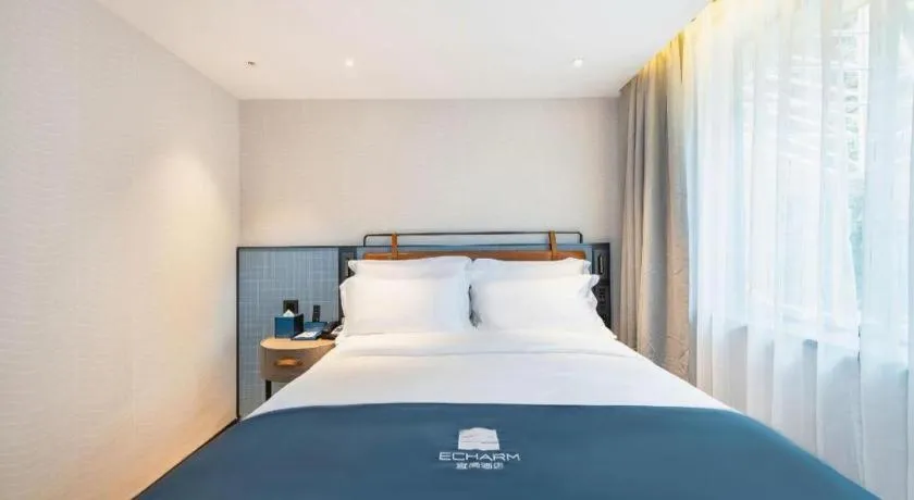 Bed in Echarm Hotel Guangzhou Tiyu West Raod Metro Station
