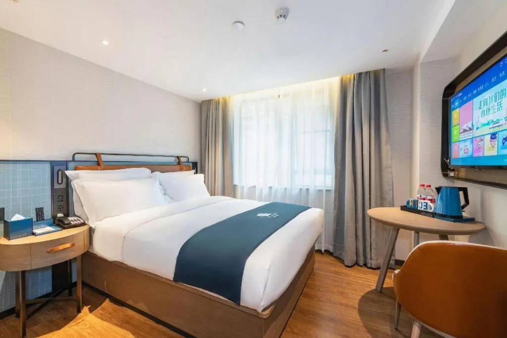 Bed in Echarm Hotel Guangzhou Tiyu West Raod Metro Station