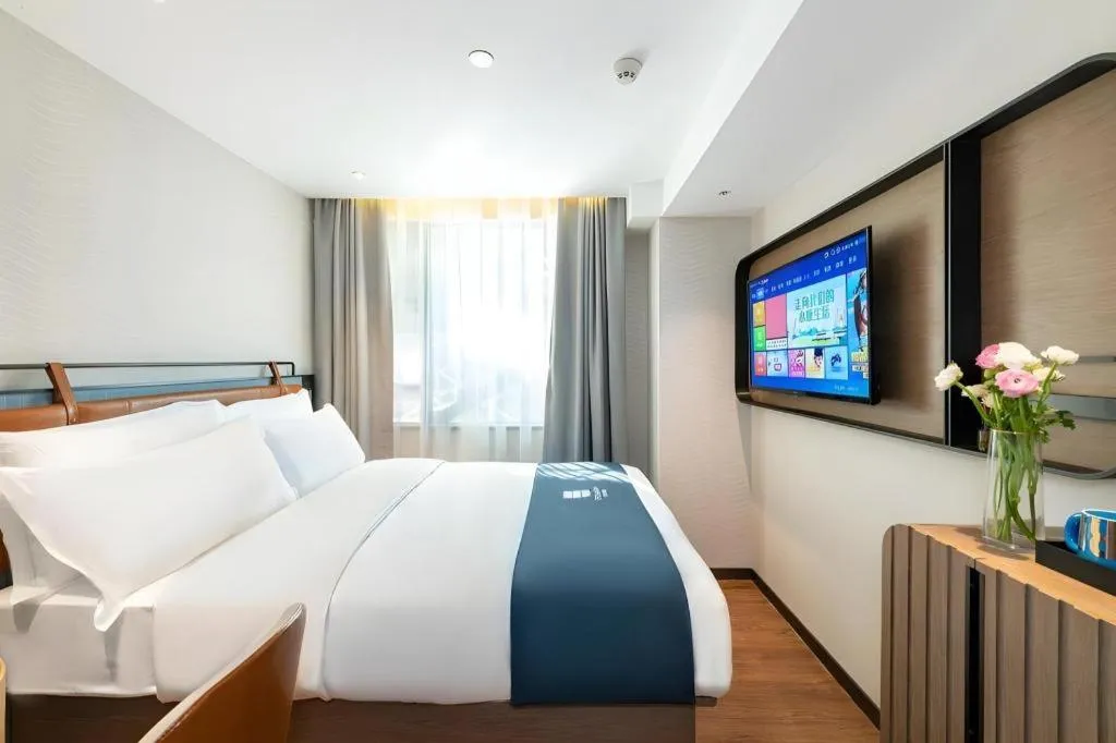 Bed in Echarm Hotel Guangzhou Tiyu West Raod Metro Station