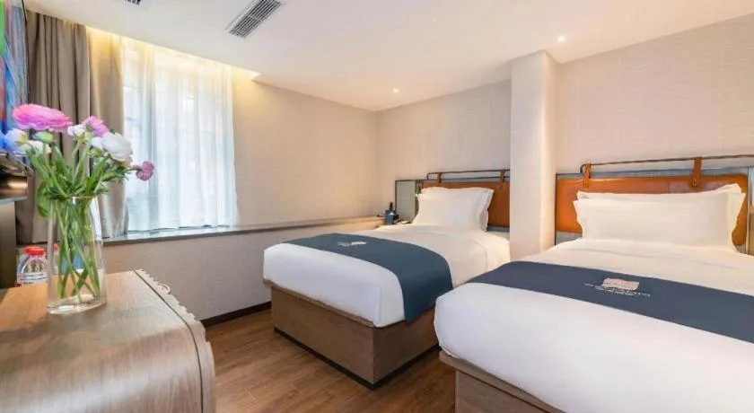 Bed in Echarm Hotel Guangzhou Tiyu West Raod Metro Station