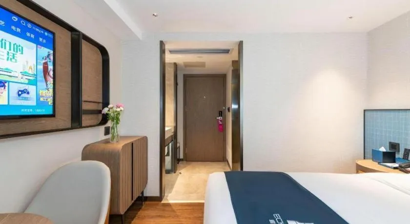 Bed in Echarm Hotel Guangzhou Tiyu West Raod Metro Station
