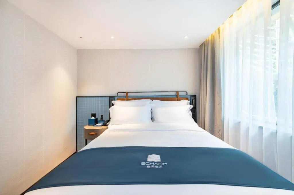 Bed in Echarm Hotel Guangzhou Tiyu West Raod Metro Station