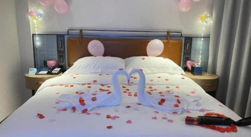 Bed in Echarm Hotel Guangzhou Tiyu West Raod Metro Station