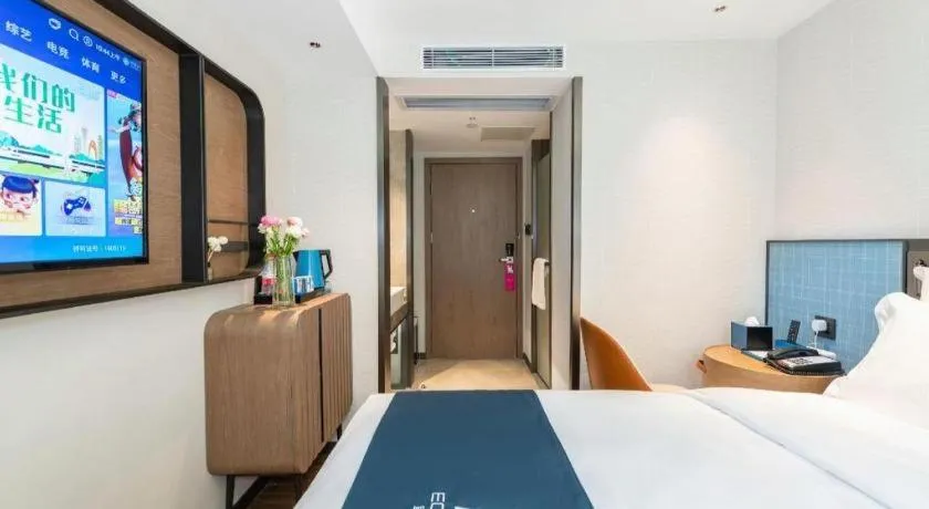Bed in Echarm Hotel Guangzhou Tiyu West Raod Metro Station