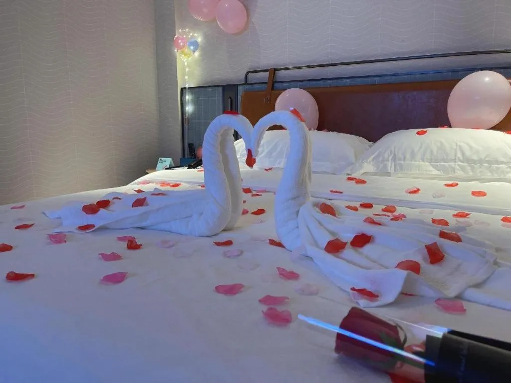 Bed in Echarm Hotel Guangzhou Tiyu West Raod Metro Station