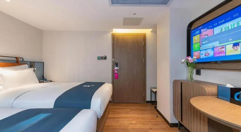 Bed in Echarm Hotel Guangzhou Tiyu West Raod Metro Station