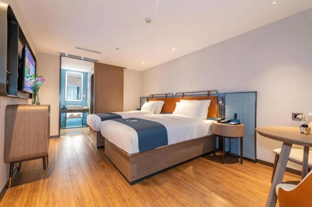 Bed in Echarm Hotel Guangzhou Tiyu West Raod Metro Station