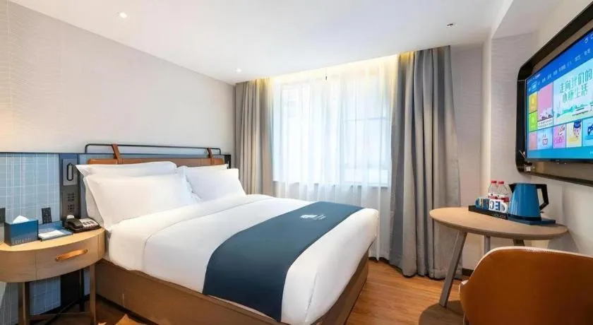 Bed in Echarm Hotel Guangzhou Tiyu West Raod Metro Station