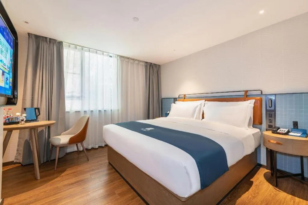 Bed in Echarm Hotel Guangzhou Tiyu West Raod Metro Station