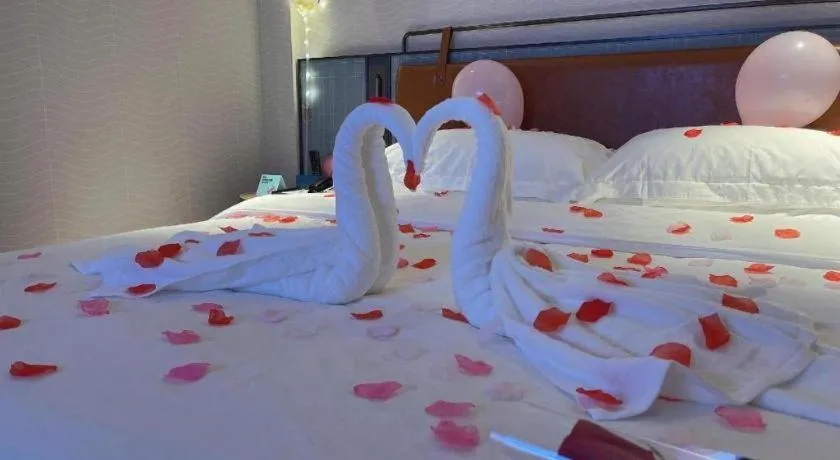 Bed in Echarm Hotel Guangzhou Tiyu West Raod Metro Station