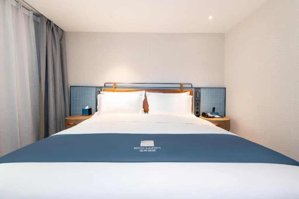 Bed in Echarm Hotel Guangzhou Tiyu West Raod Metro Station