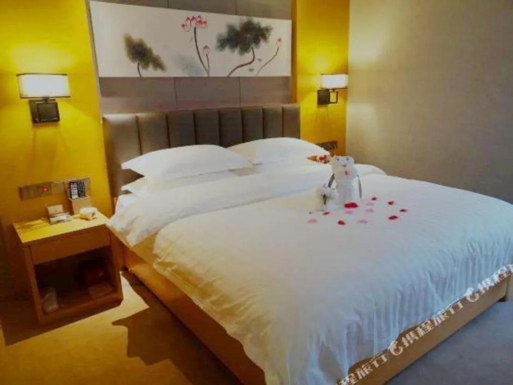 Bed in Borrman Hotel Jinan Yijia Exhibition Center Laotun Metro Station