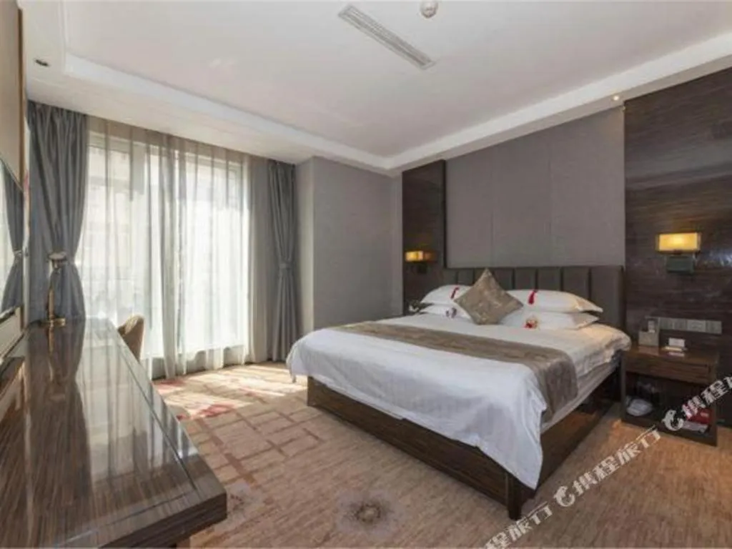 Bed in Borrman Hotel Jinan Yijia Exhibition Center Laotun Metro Station