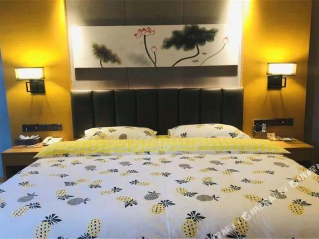 Bed in Borrman Hotel Jinan Yijia Exhibition Center Laotun Metro Station