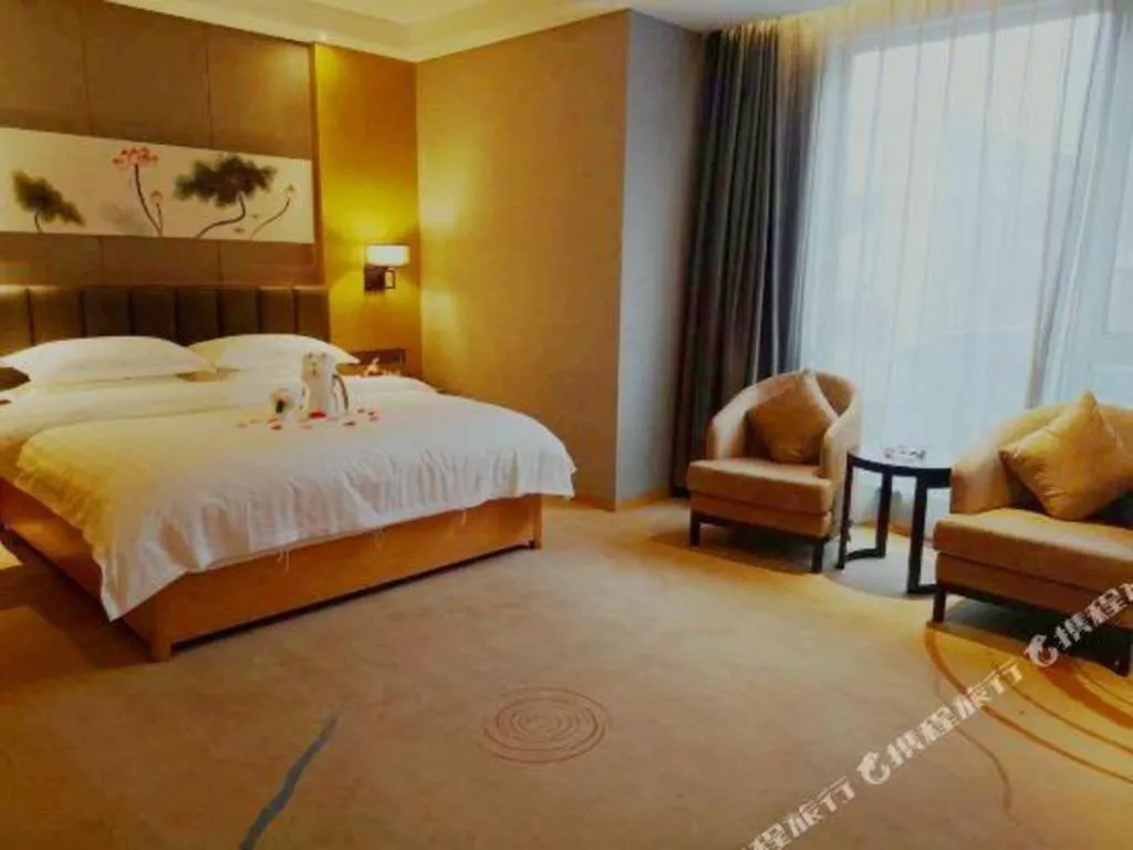 Bed in Borrman Hotel Jinan Yijia Exhibition Center Laotun Metro Station