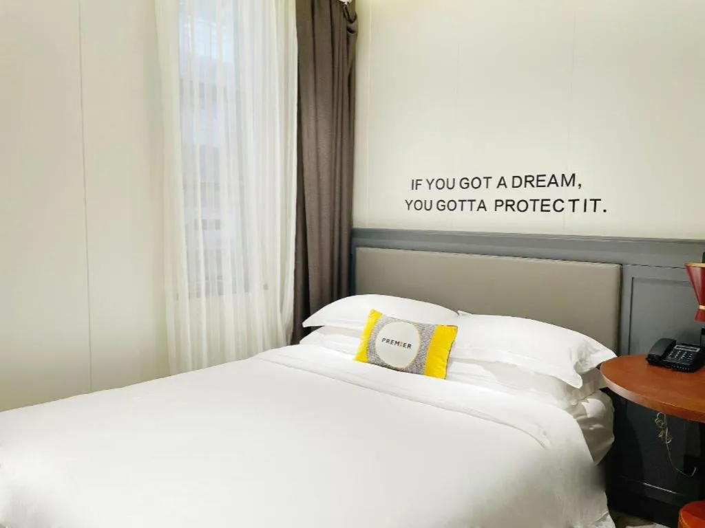 Bed in City Comfort Premier Hotel Guangzhou Tower Chigang Metro Station Pazhou Exhibition