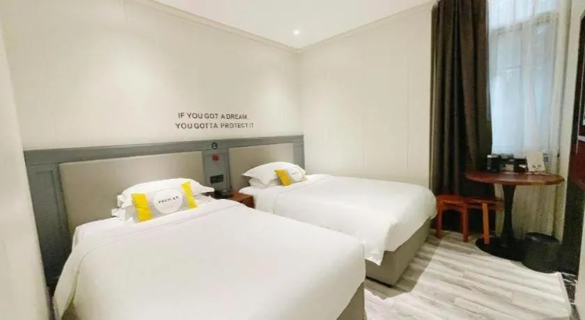 Bed in City Comfort Premier Hotel Guangzhou Tower Chigang Metro Station Pazhou Exhibition