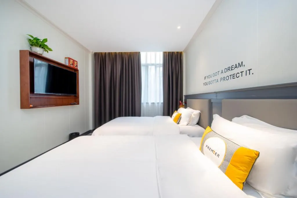 Bed in City Comfort Premier Hotel Guangzhou Tower Chigang Metro Station Pazhou Exhibition