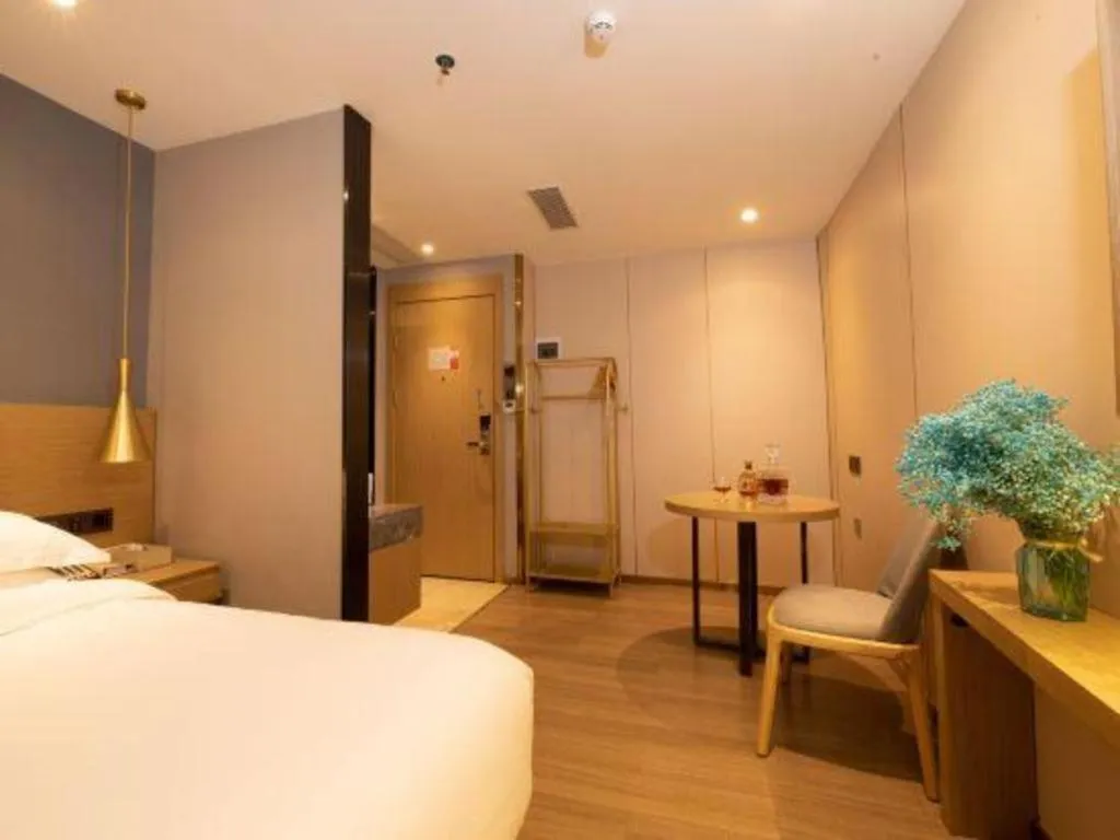 Bed in Echarm Hotel Guangzhou Gangding Huashi Metro Station