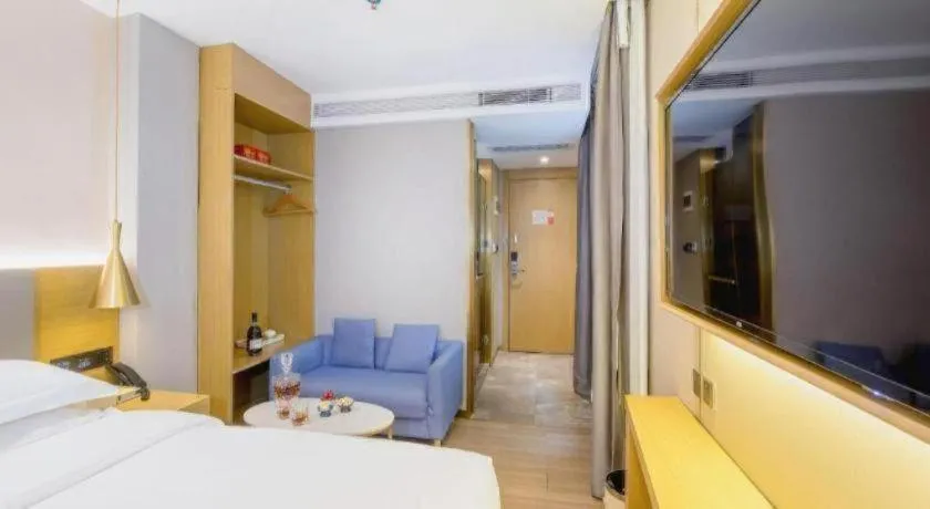 Bed in Echarm Hotel Guangzhou Gangding Huashi Metro Station