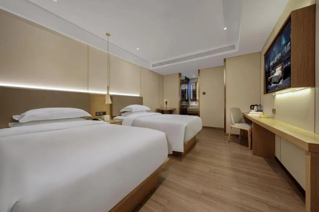 Bed in Echarm Hotel Guangzhou Gangding Huashi Metro Station