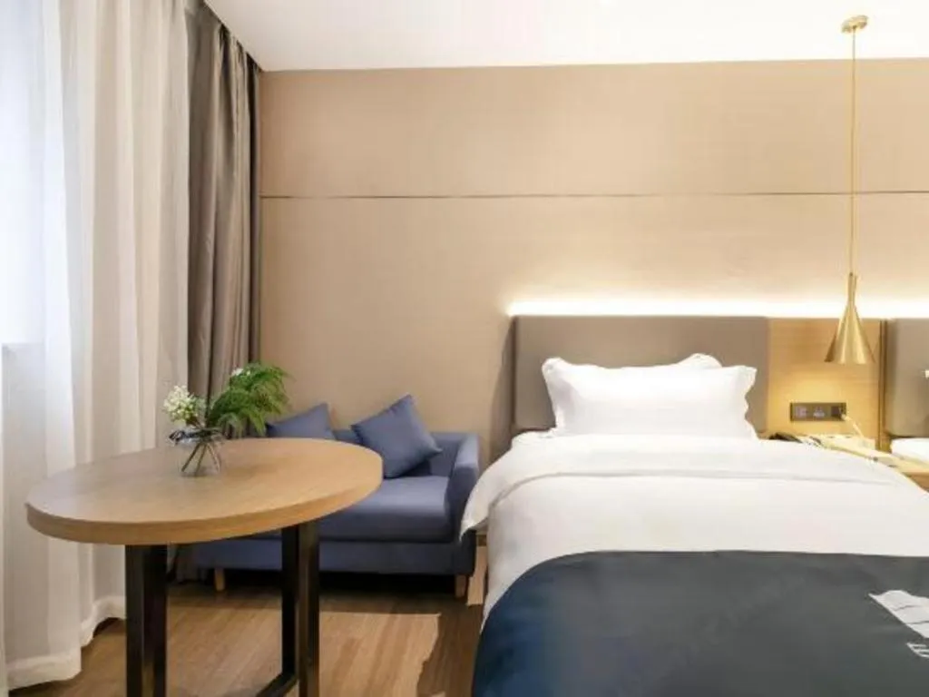 Bed in Echarm Hotel Guangzhou Gangding Huashi Metro Station