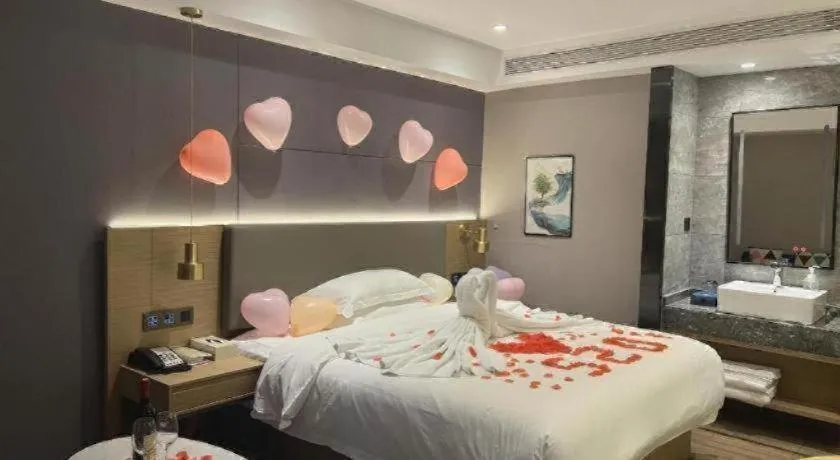 Bed in Echarm Hotel Guangzhou Gangding Huashi Metro Station