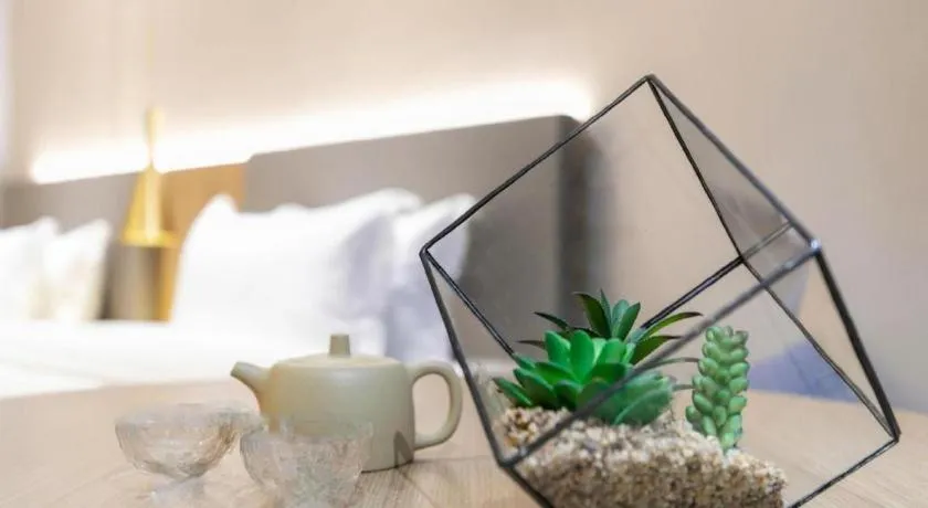 Bed in Echarm Hotel Guangzhou Gangding Huashi Metro Station