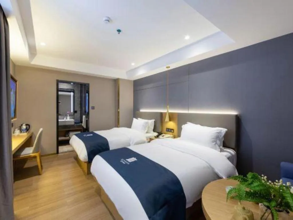 Bed in Echarm Hotel Guangzhou Gangding Huashi Metro Station