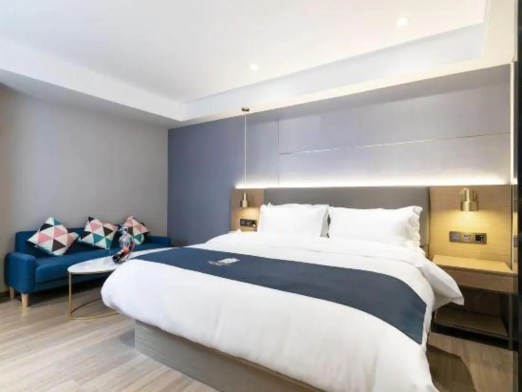 Bed in Echarm Hotel Guangzhou Gangding Huashi Metro Station