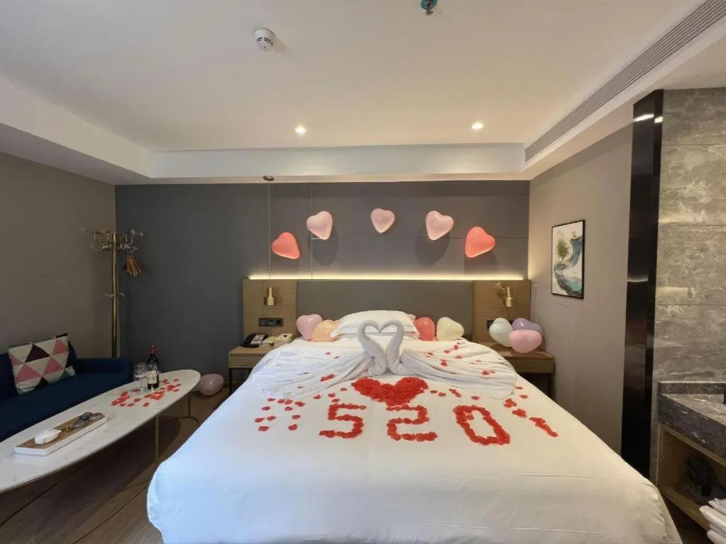 Bed in Echarm Hotel Guangzhou Gangding Huashi Metro Station