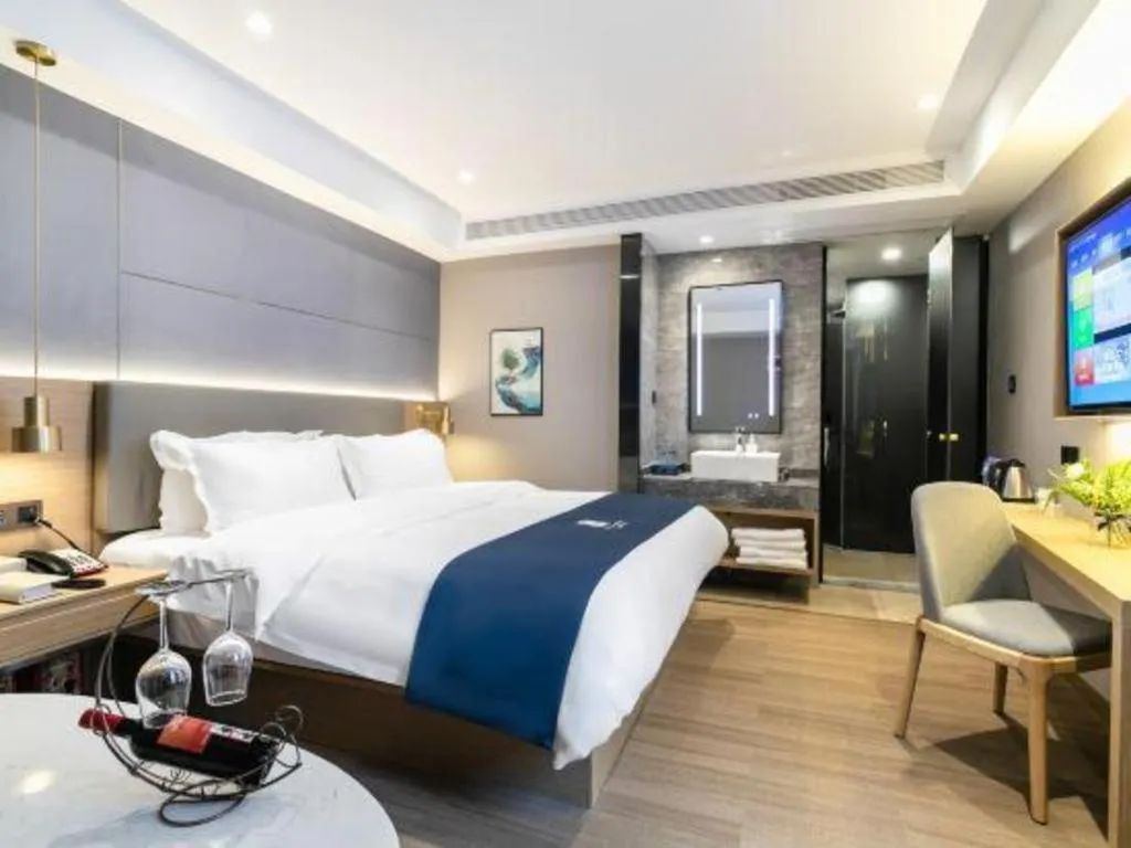 Bed in Echarm Hotel Guangzhou Gangding Huashi Metro Station