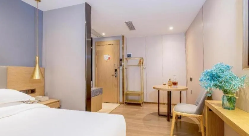 Bed in Echarm Hotel Guangzhou Gangding Huashi Metro Station