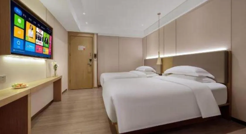 Bed in Echarm Hotel Guangzhou Gangding Huashi Metro Station