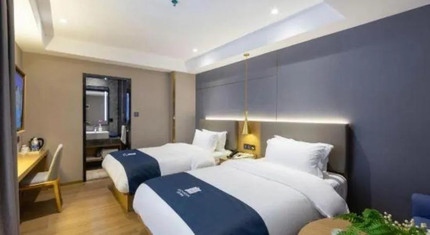 Bed in Echarm Hotel Guangzhou Gangding Huashi Metro Station