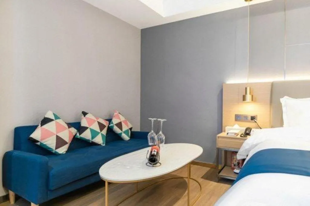 Bed in Echarm Hotel Guangzhou Gangding Huashi Metro Station