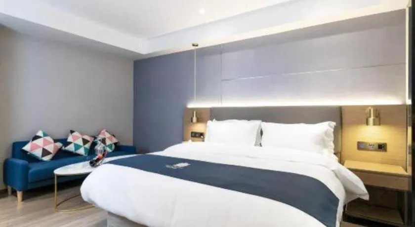 Bed in Echarm Hotel Guangzhou Gangding Huashi Metro Station