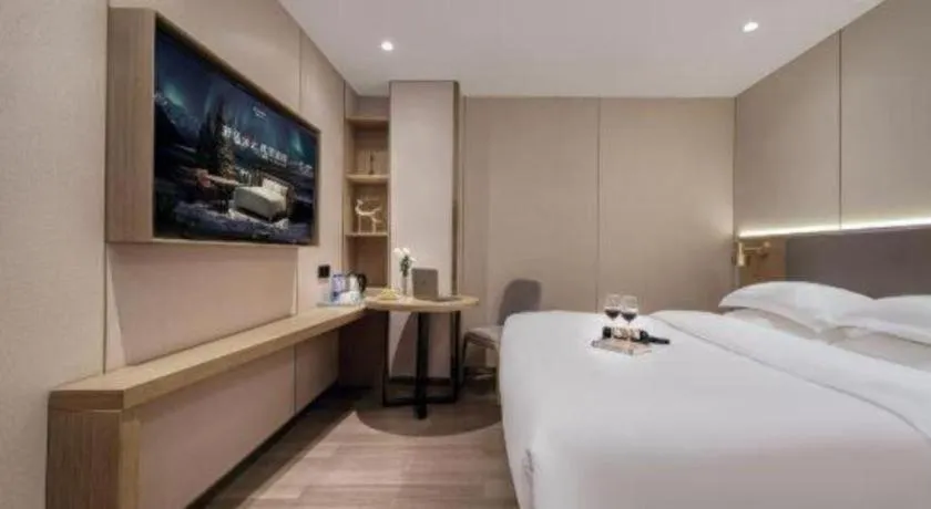 Bed in Echarm Hotel Guangzhou Gangding Huashi Metro Station