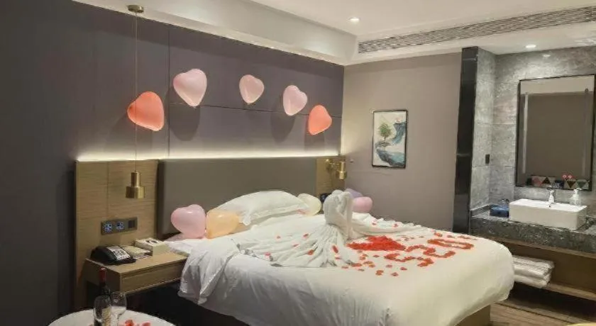 Bed in Echarm Hotel Guangzhou Gangding Huashi Metro Station