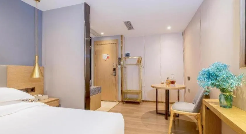 Bed in Echarm Hotel Guangzhou Gangding Huashi Metro Station