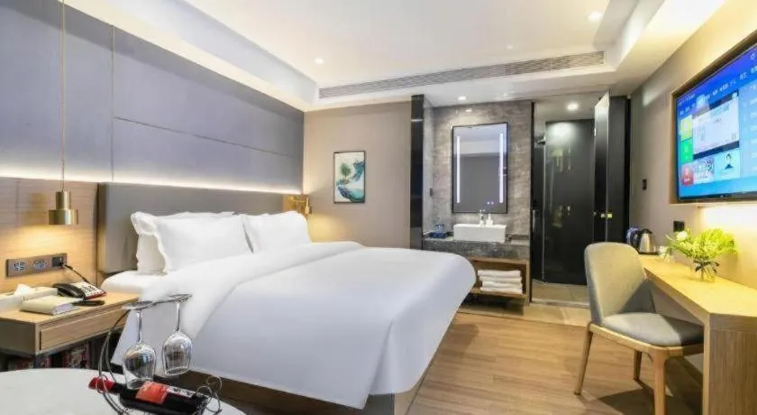 Bed in Echarm Hotel Guangzhou Gangding Huashi Metro Station